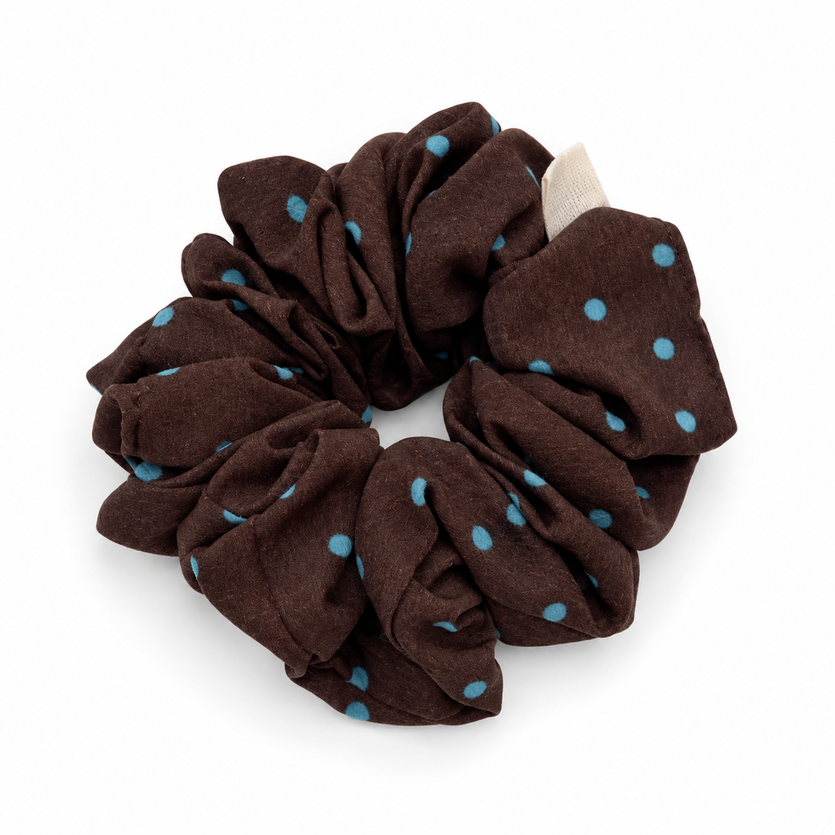 Dunkelbrauner Scrunchie mit türkisen Punkten