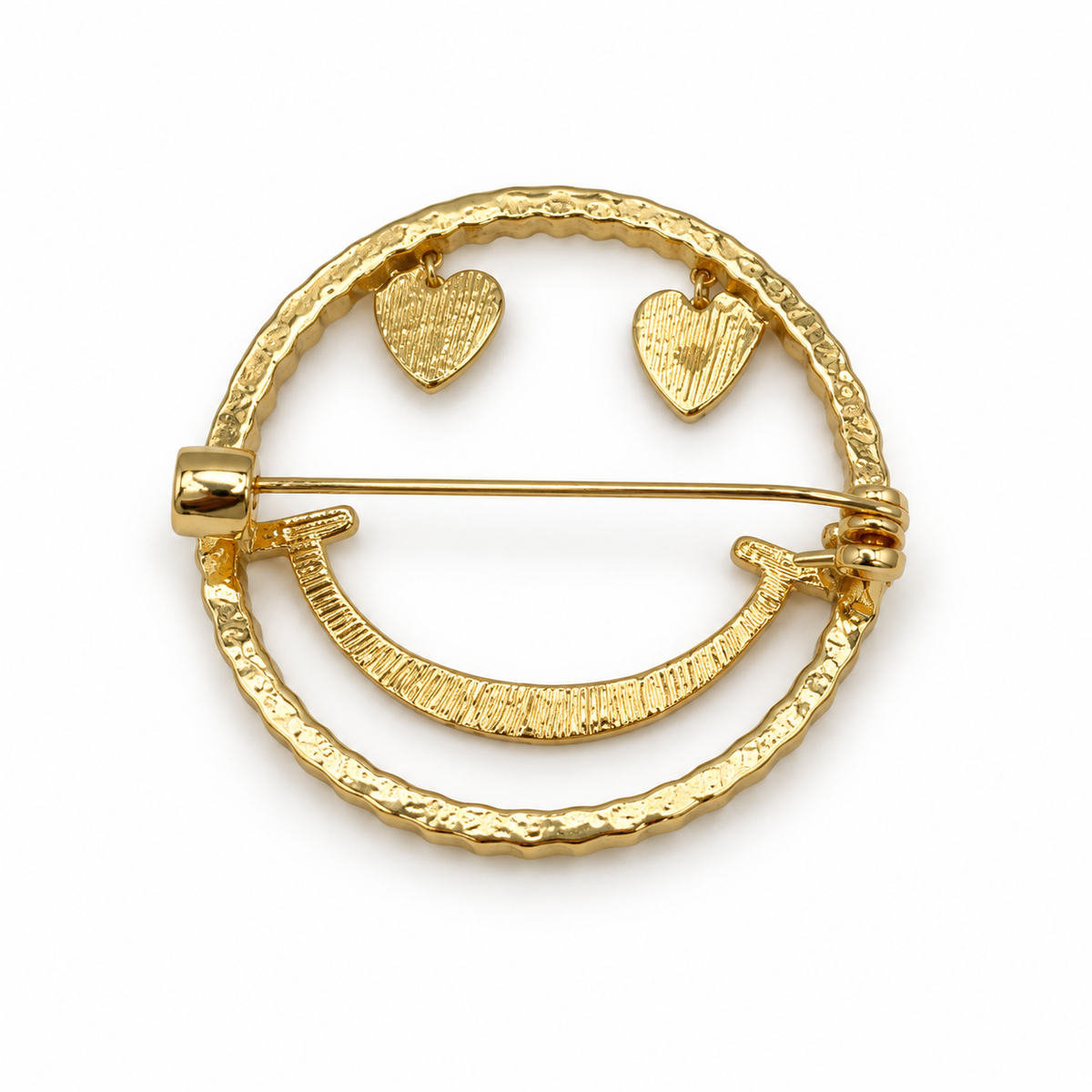 Goldfarbene Smiley-Brosche mit Herzaugen – Rückseite mit Nadel